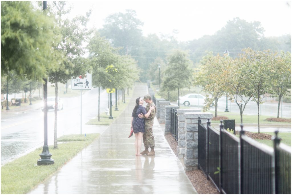 couple in the rain during engagement session