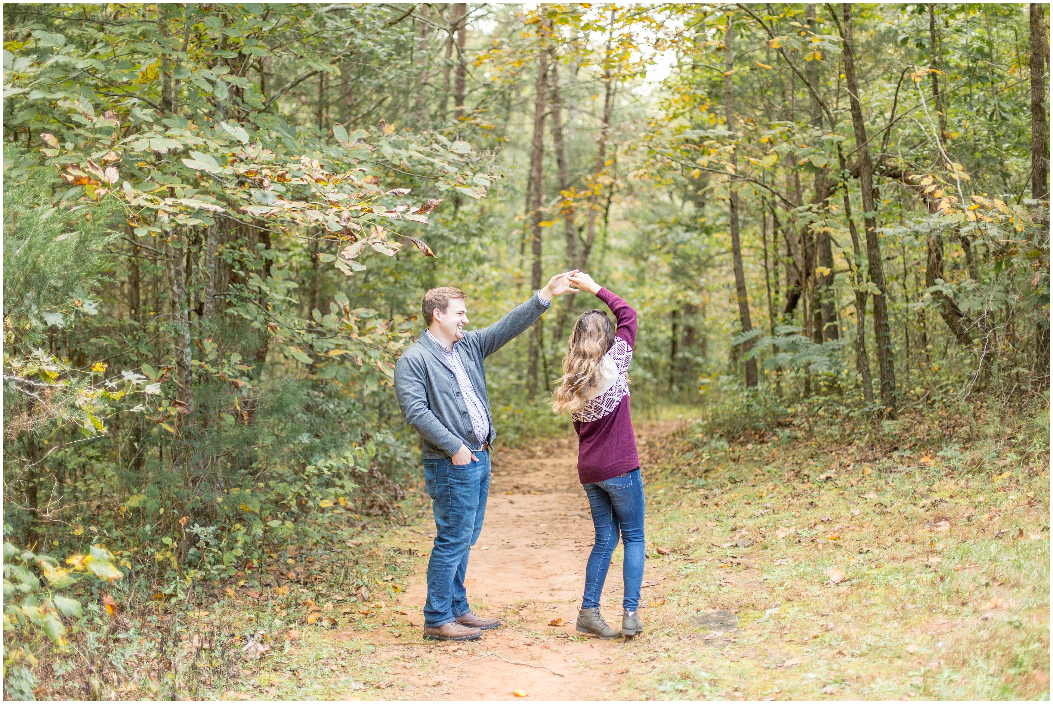 engaged couple dance in near woods in greenville SC