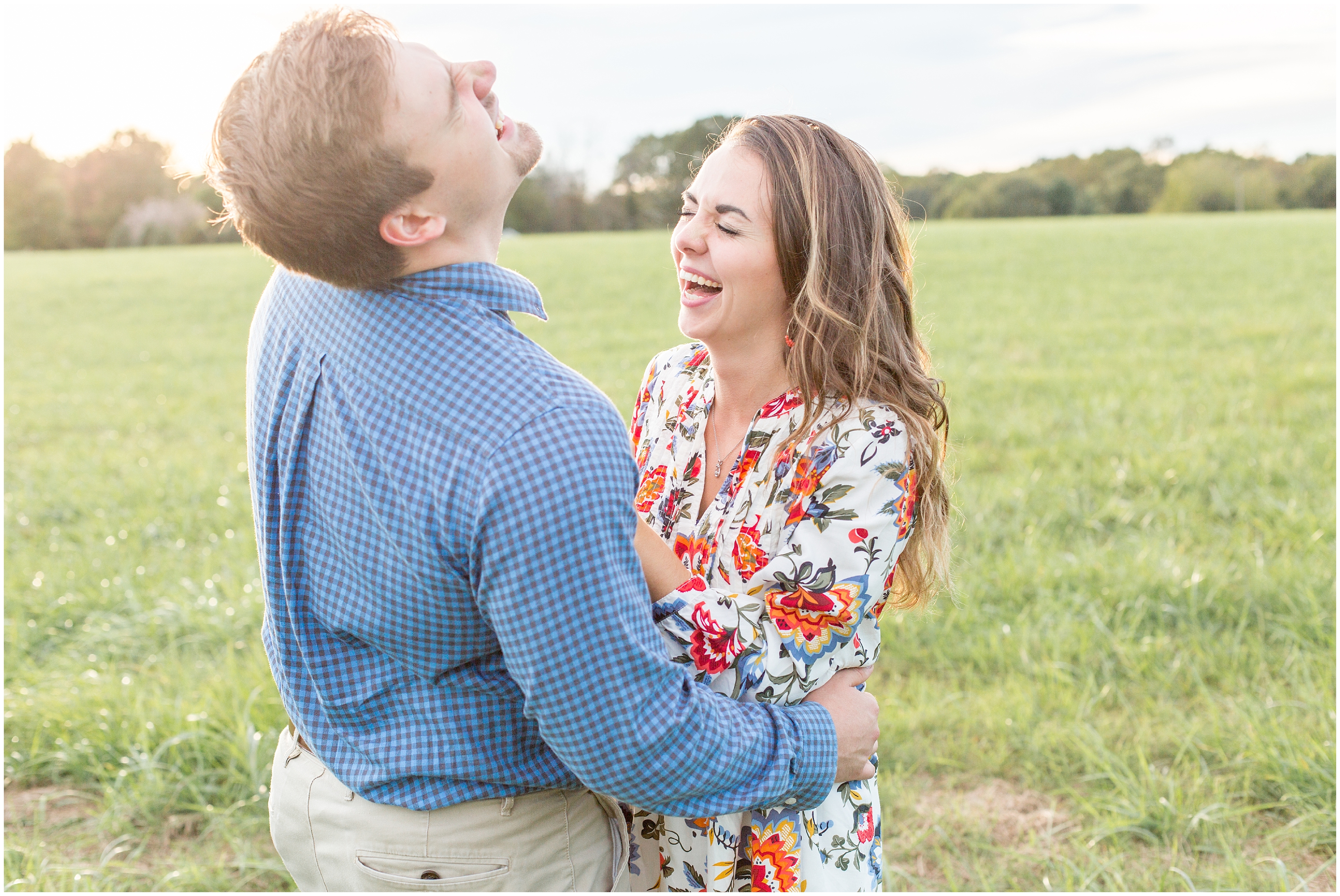 couple shares a laugh during covered Bridge engagement session