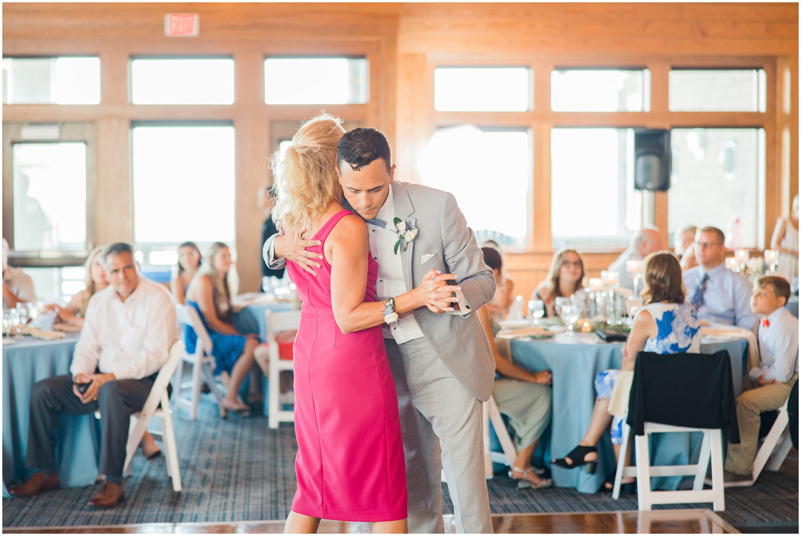 groom dances with mom during NC wedding reception