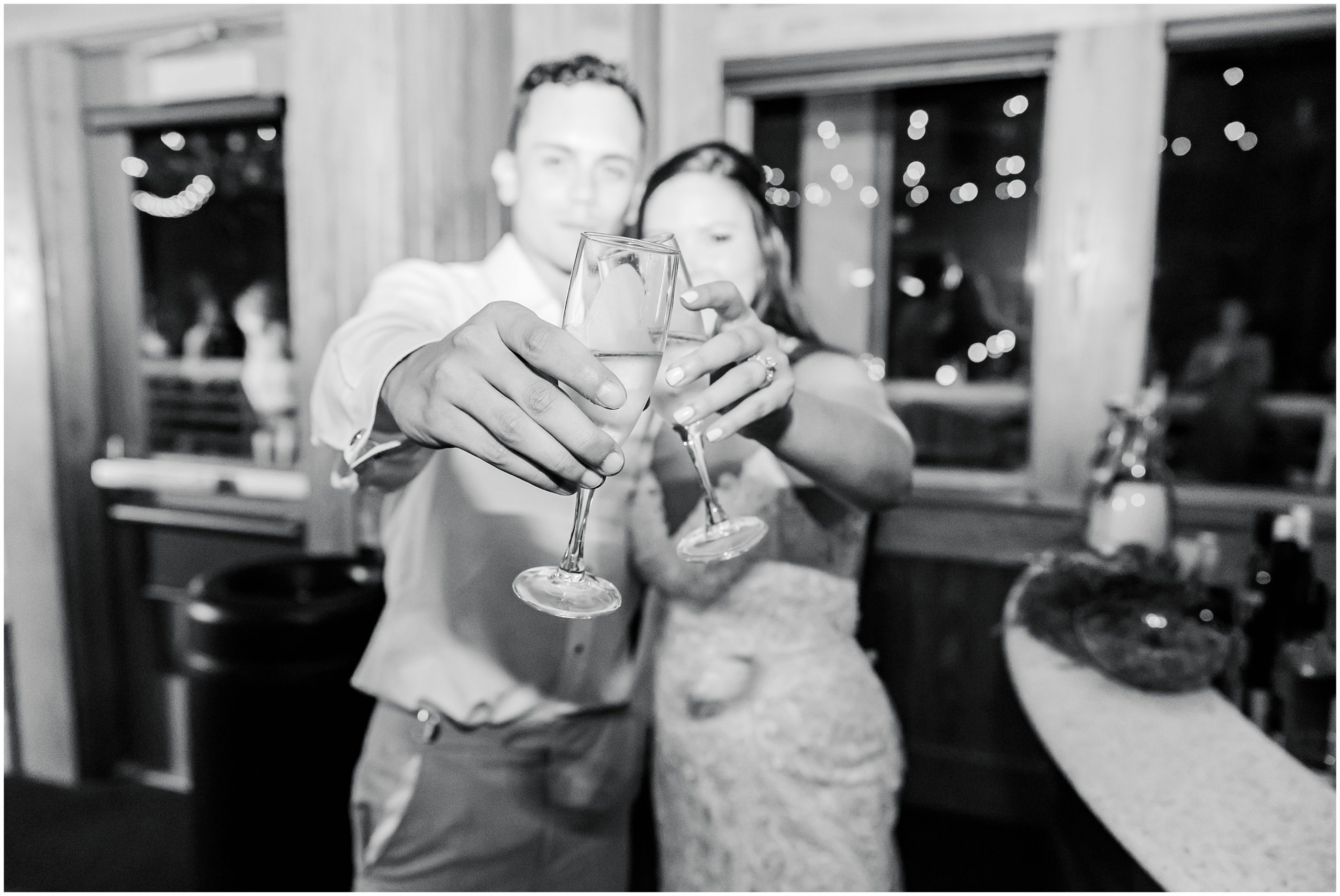 newlyweds toast with champagne glasses