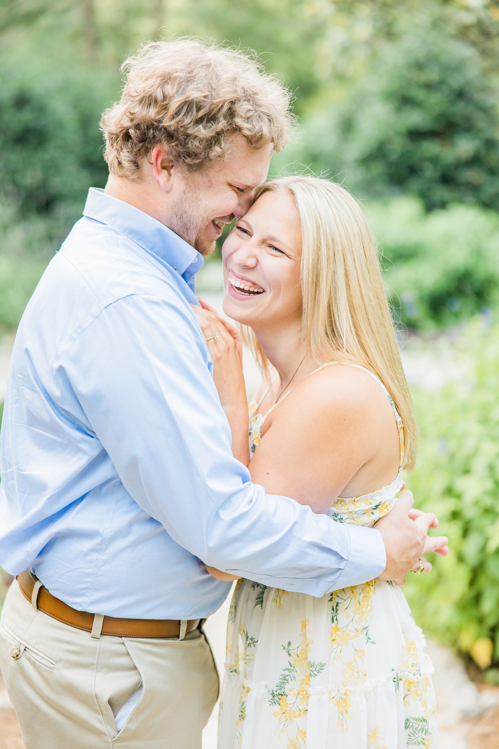 bride laughs during engagement session in Charlotte NC