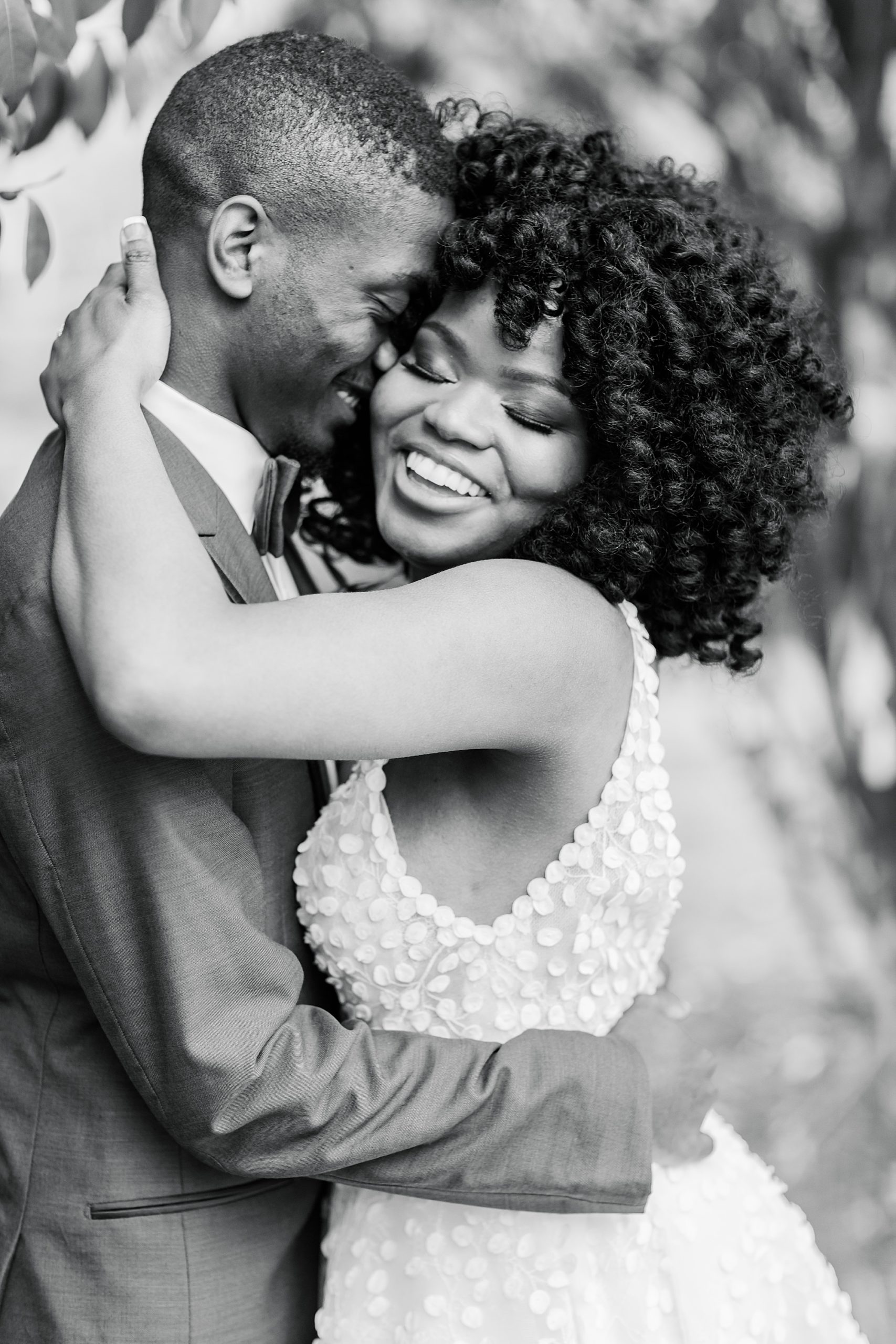 bride hugs groom after proposal during styled shoot