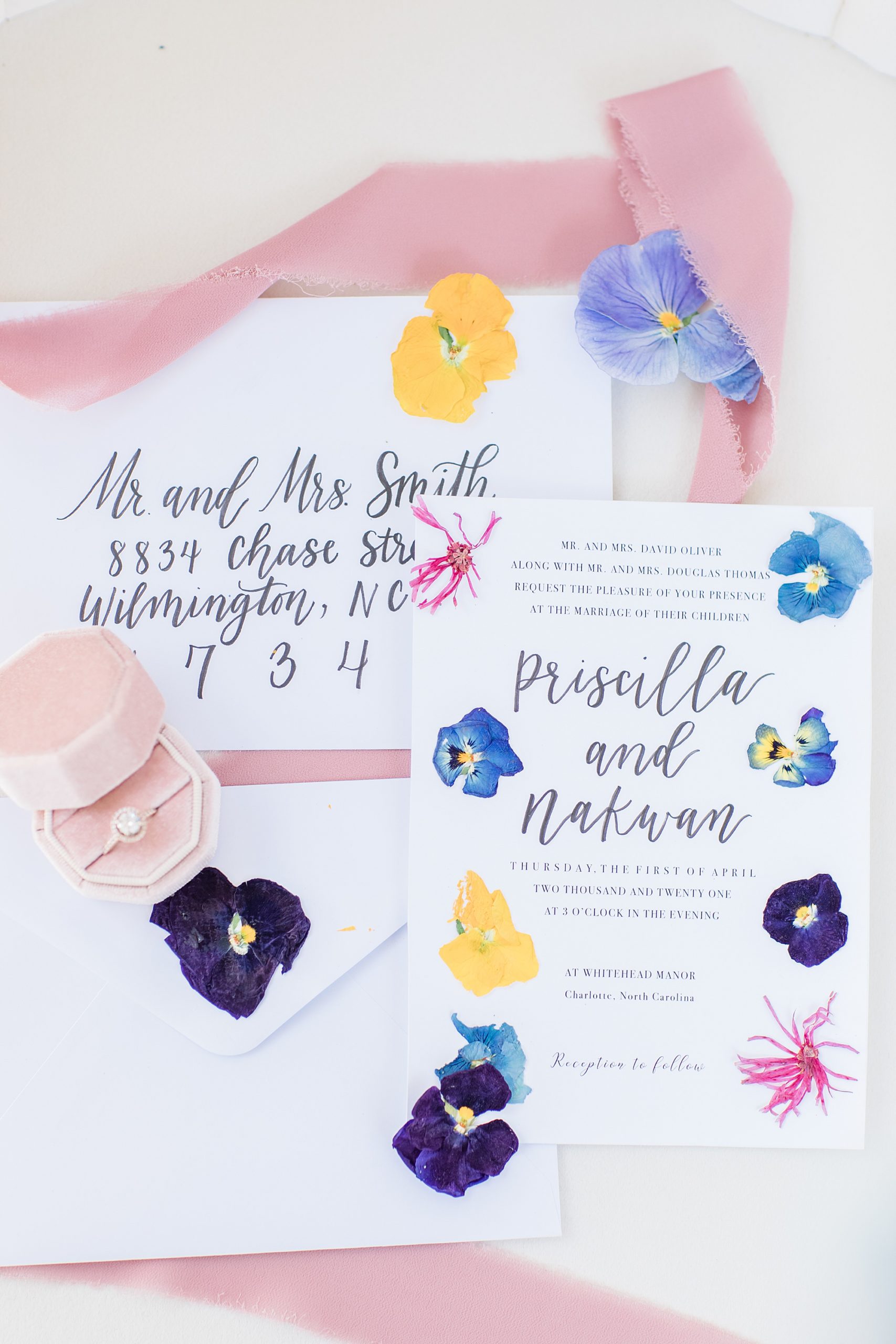 inviation suite with calligraphy and painted watercolor flowers