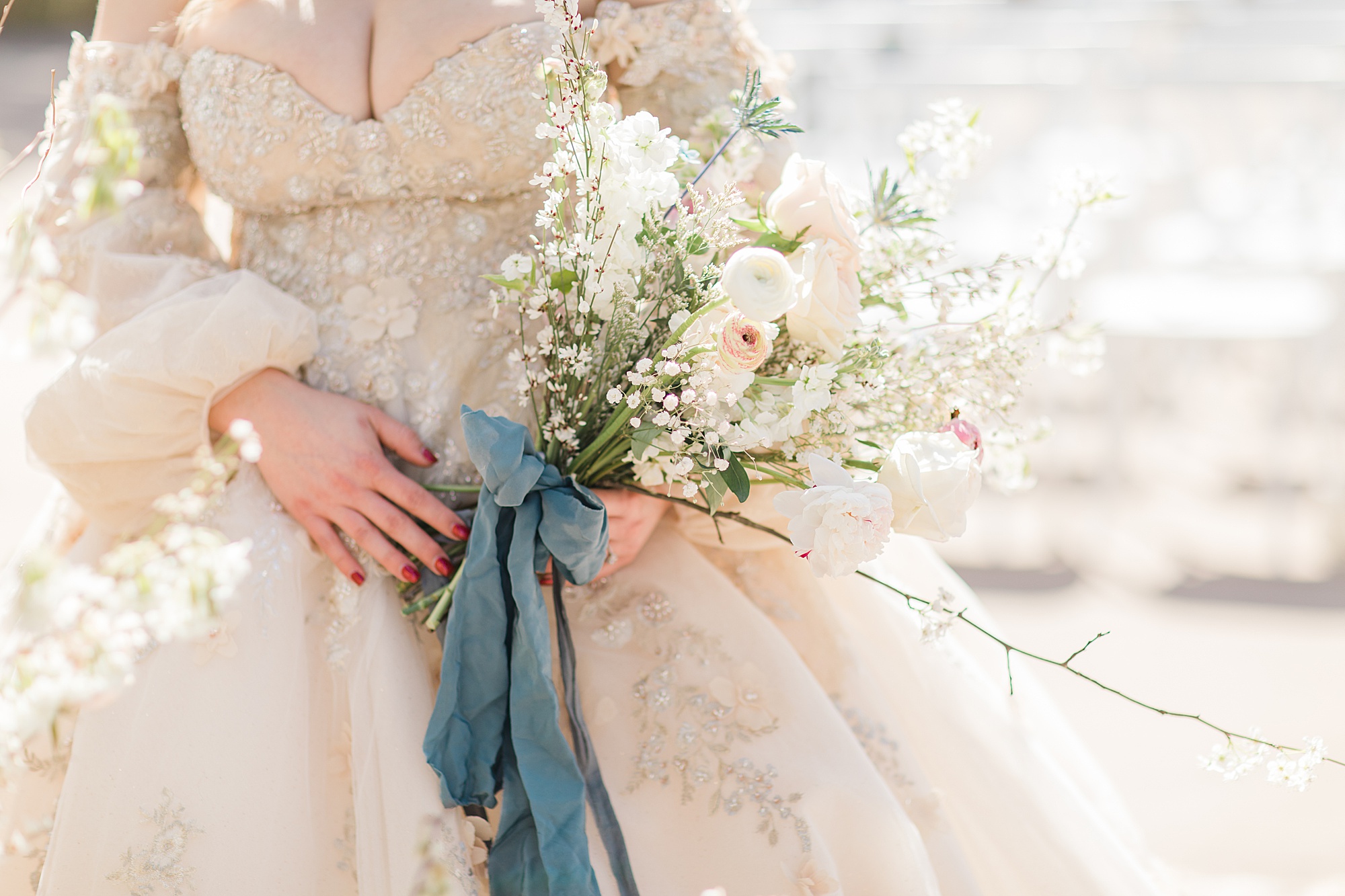 bride's bouquet of pastel and white flowers