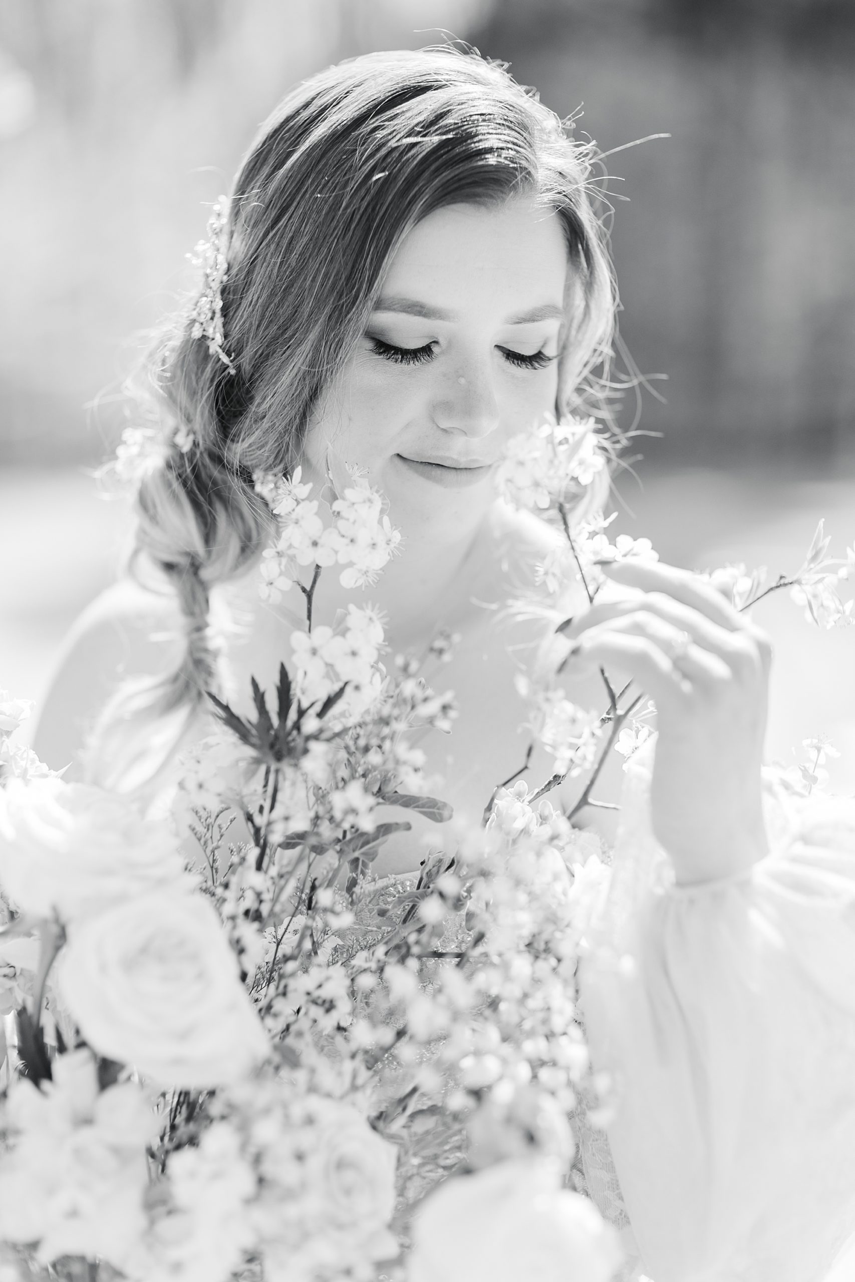 bride looks down at bouquet during Charlotte NC wedding day