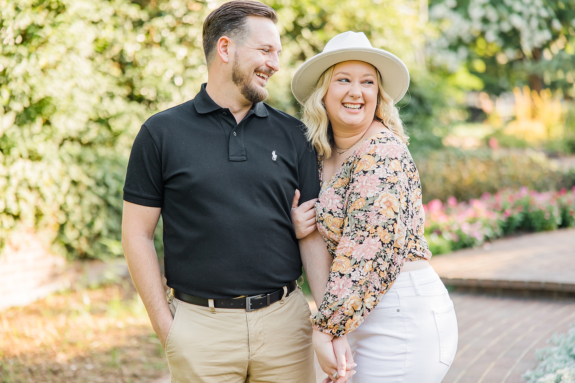 engaged couple laughs together during Rock Hill SC engagement photos 