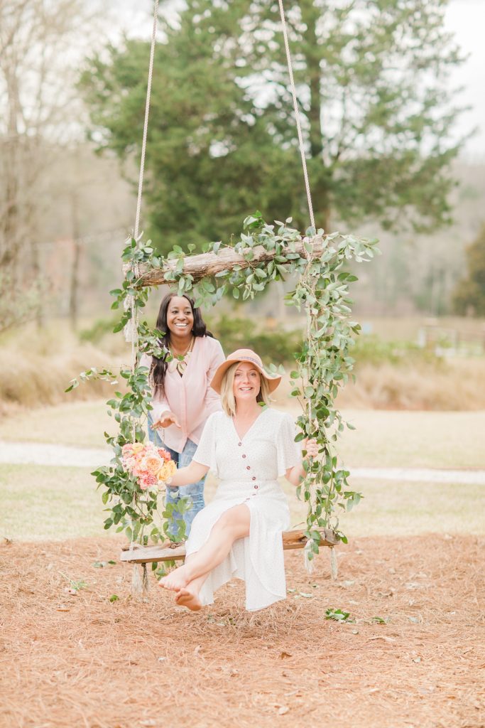 woman sits on swing during North Corner Haven styled shoot