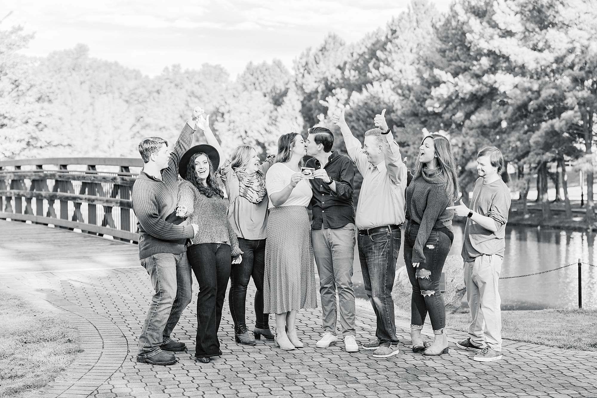 family cheers during pregnancy announcement in Spartanburg SC