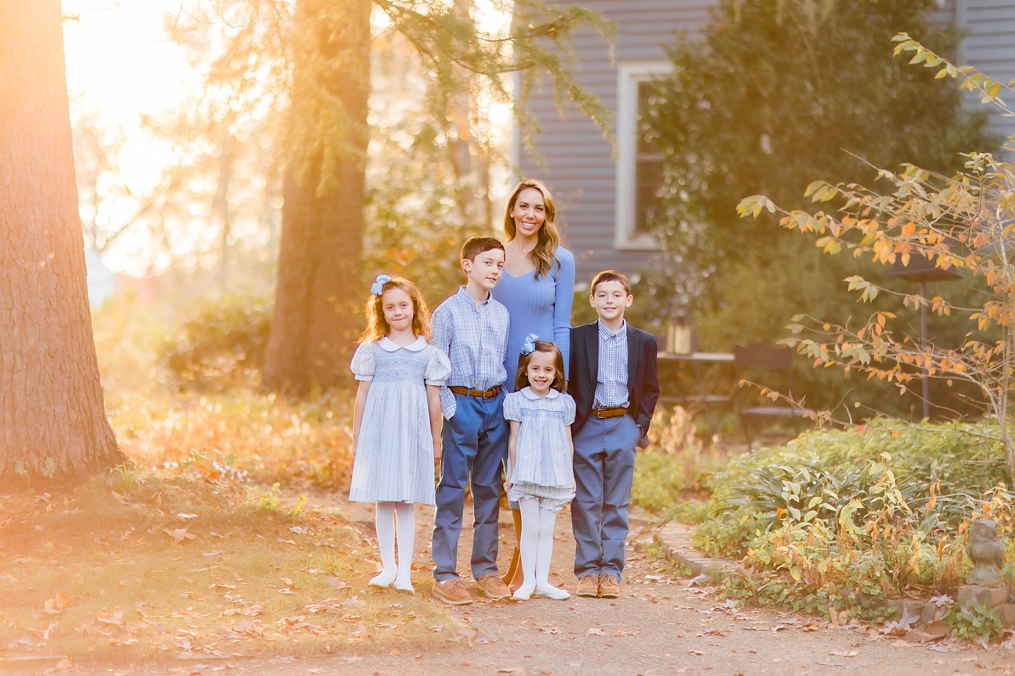 mom poses with four children during The Ivy Place mini sessions