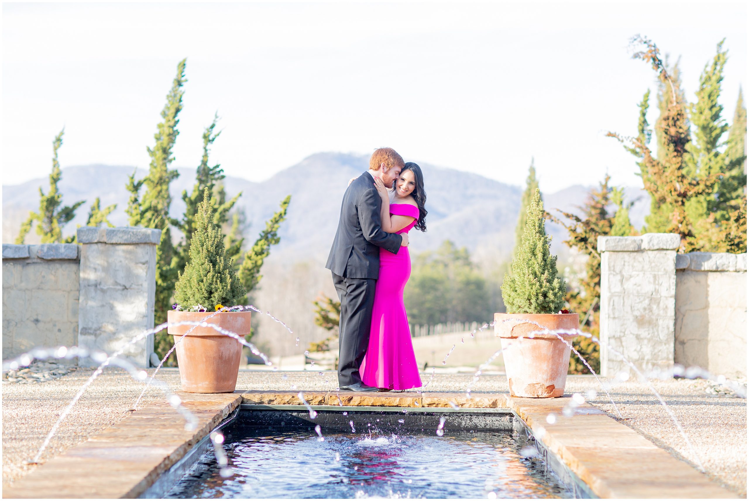 engaged couple by inground pool at Hotel Domestique in SC for Engagement Session