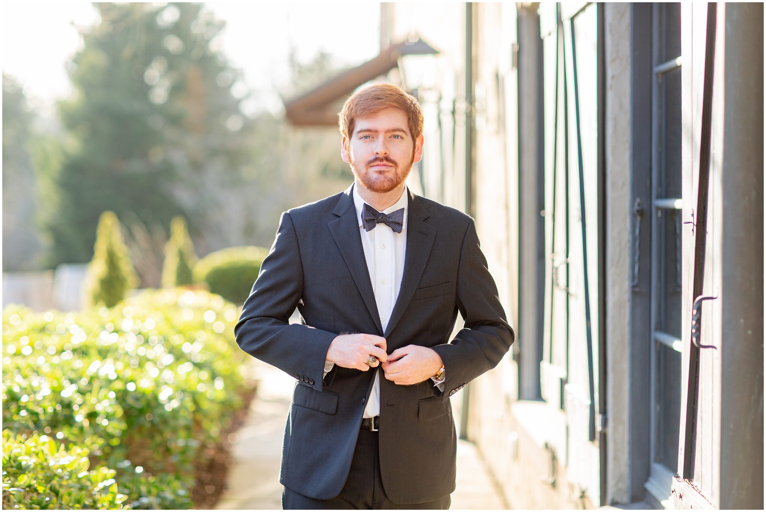 man in suit during engagement photos