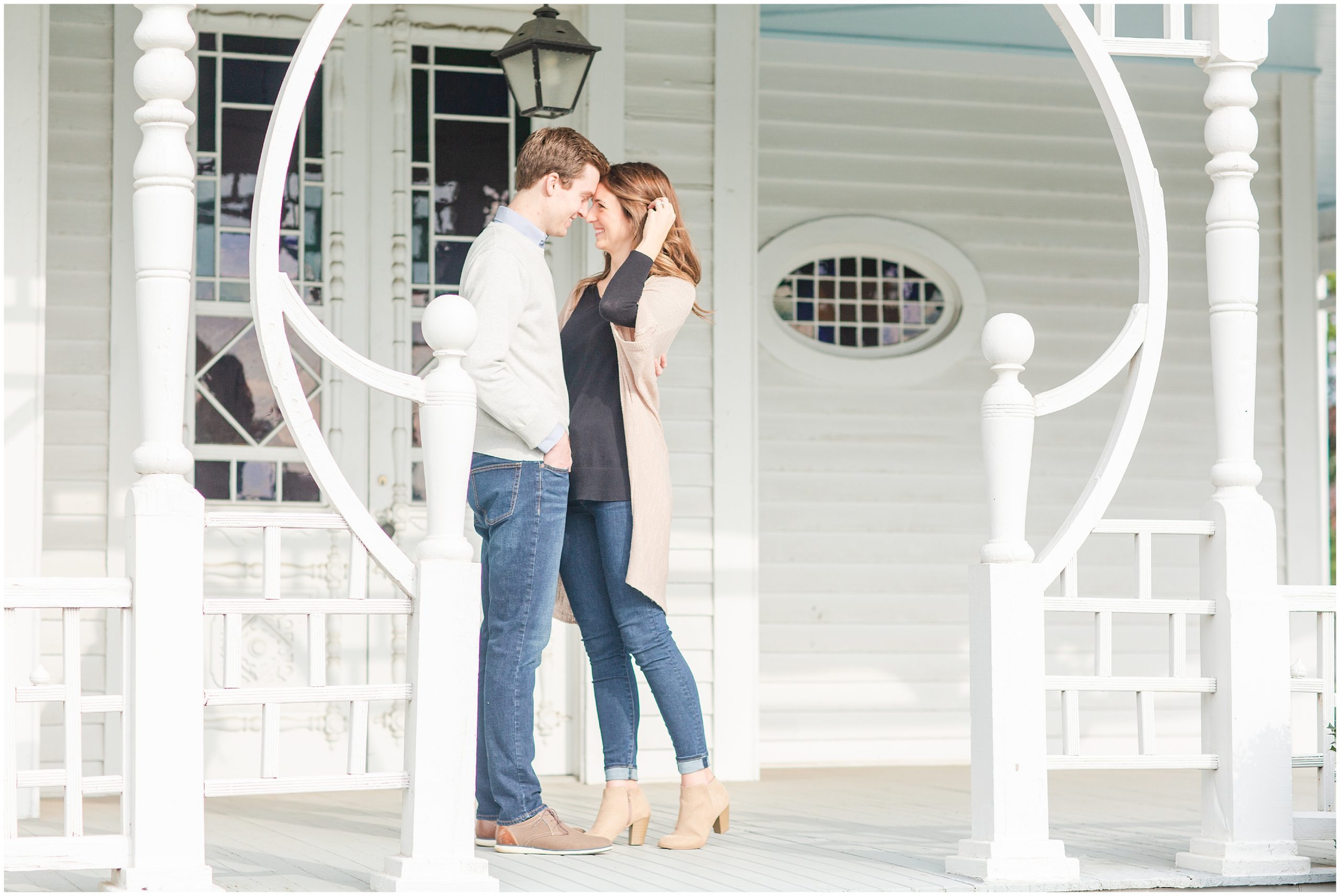 married couple hugs on front steps
