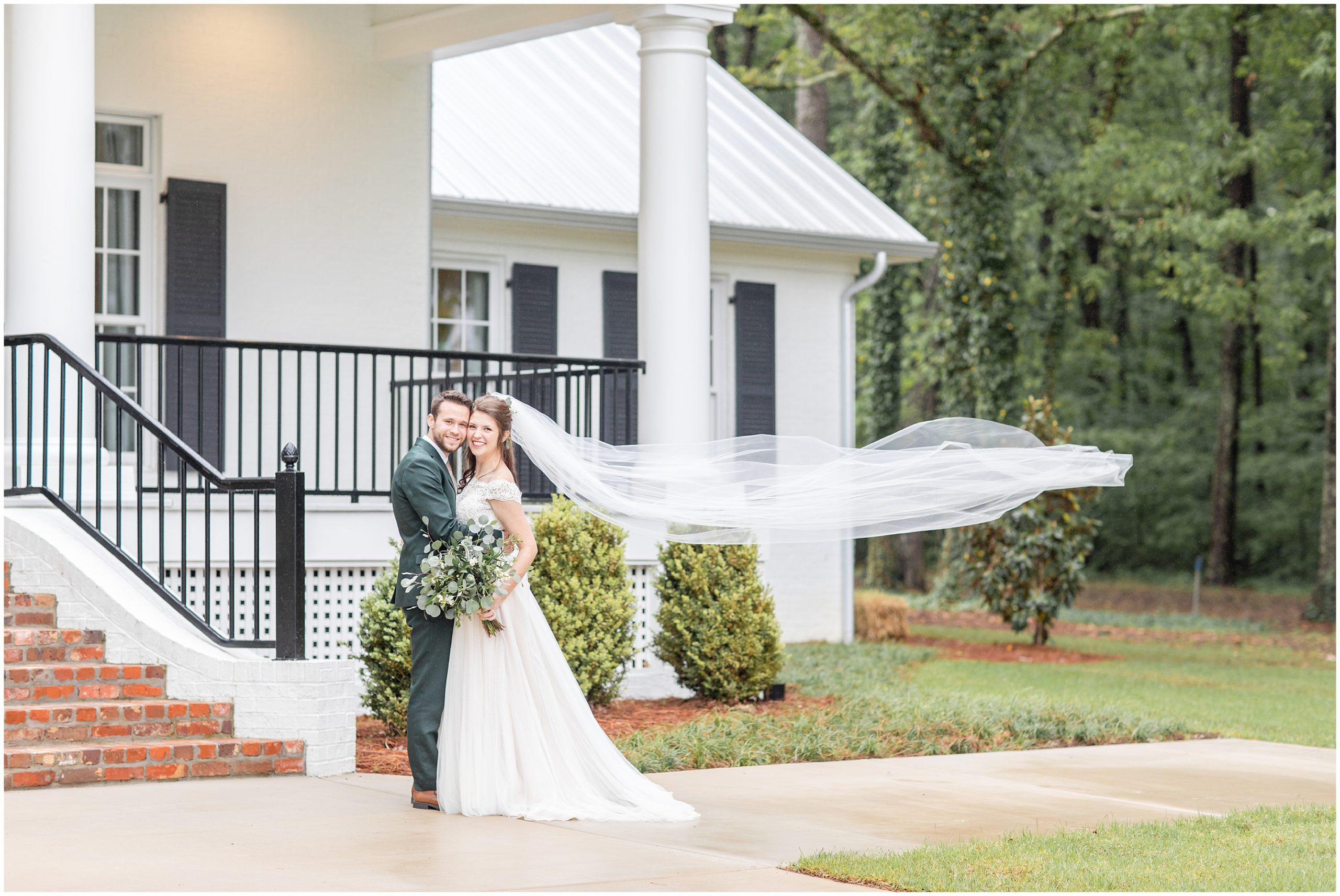 bride's veil floats during portraits after Southern Alabama Wedding at The Witt House