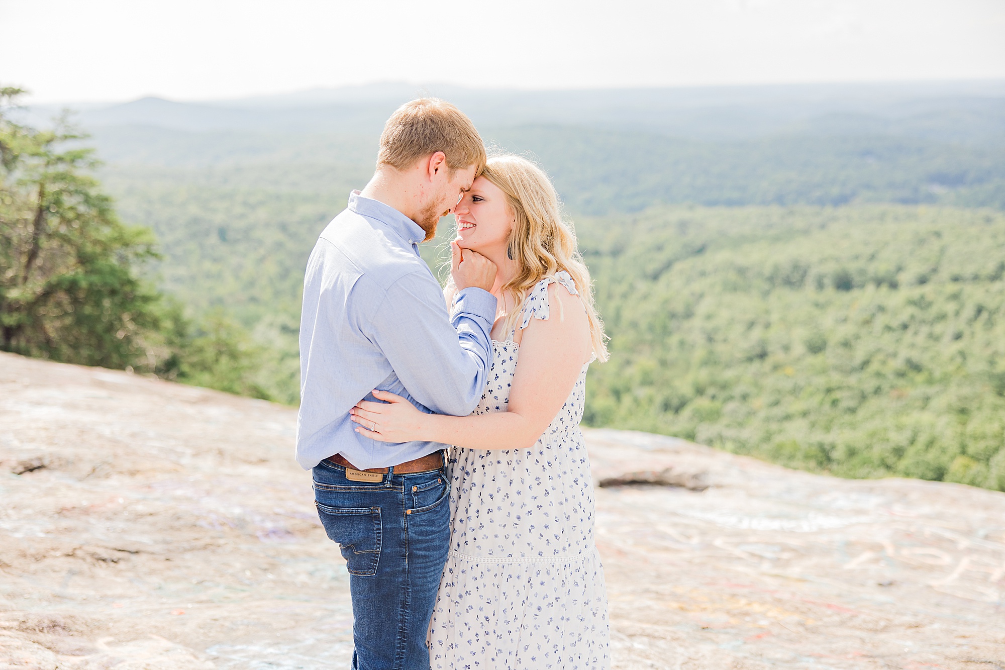 bride and groom kiss during Bald Rock engagement session