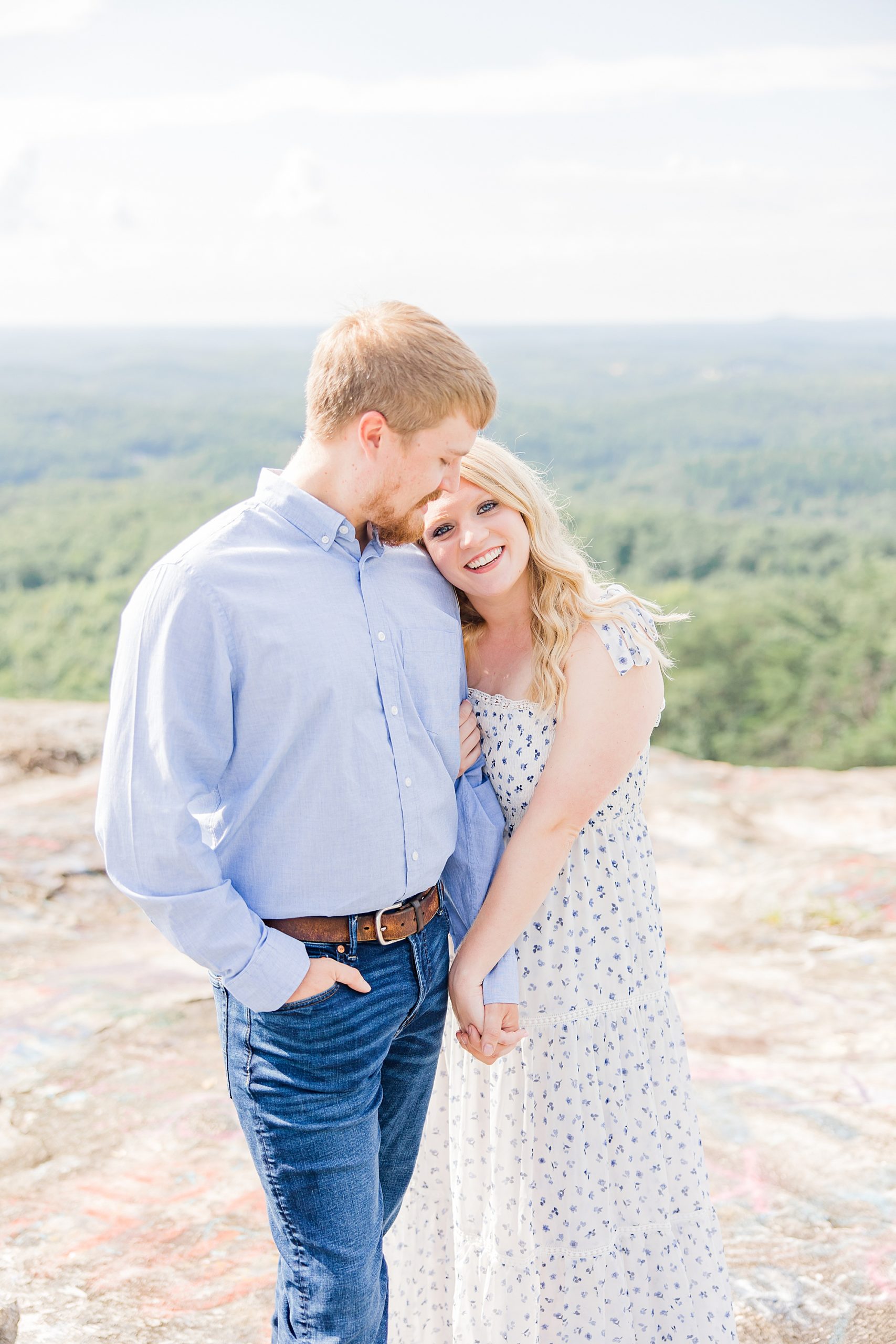 engaged couple holds hands during Bald Rock engagement session