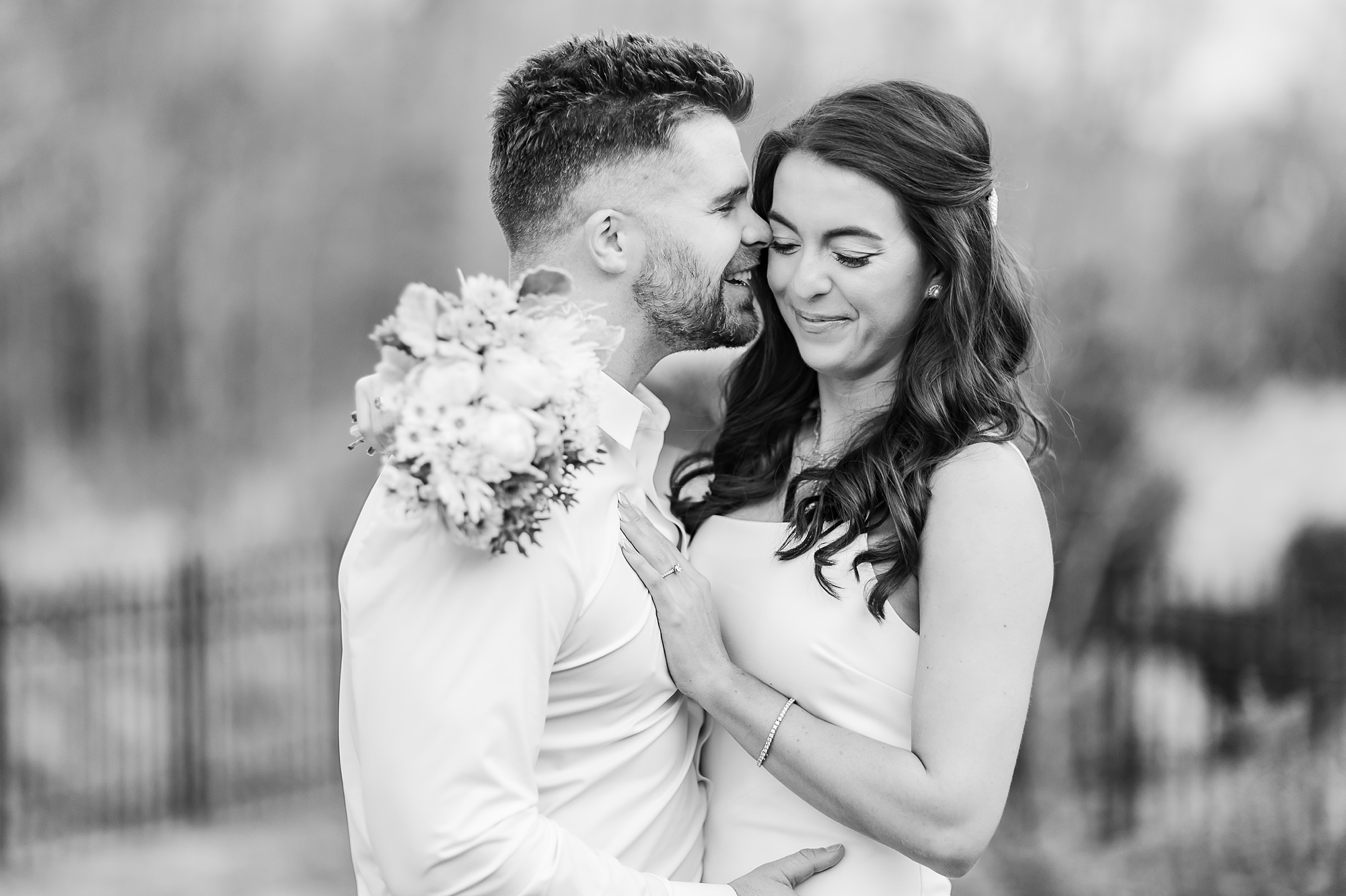 groom nuzzles bride's cheek during portraits before NC elopement 
