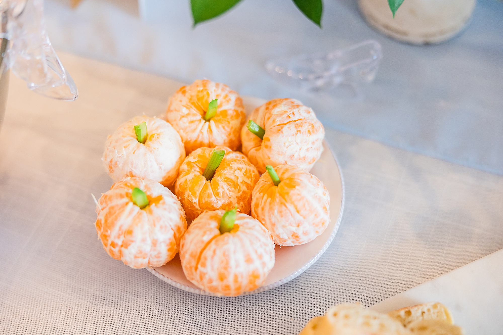 oranges designed to look like pumpkins for birthday party 
