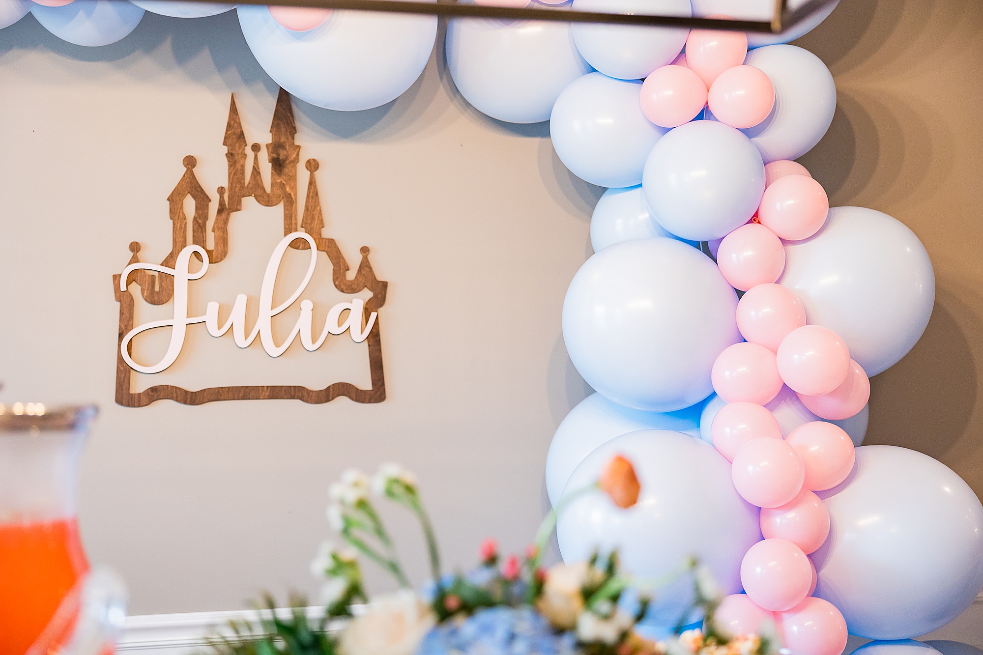 balloon arch indoors for first birthday party 