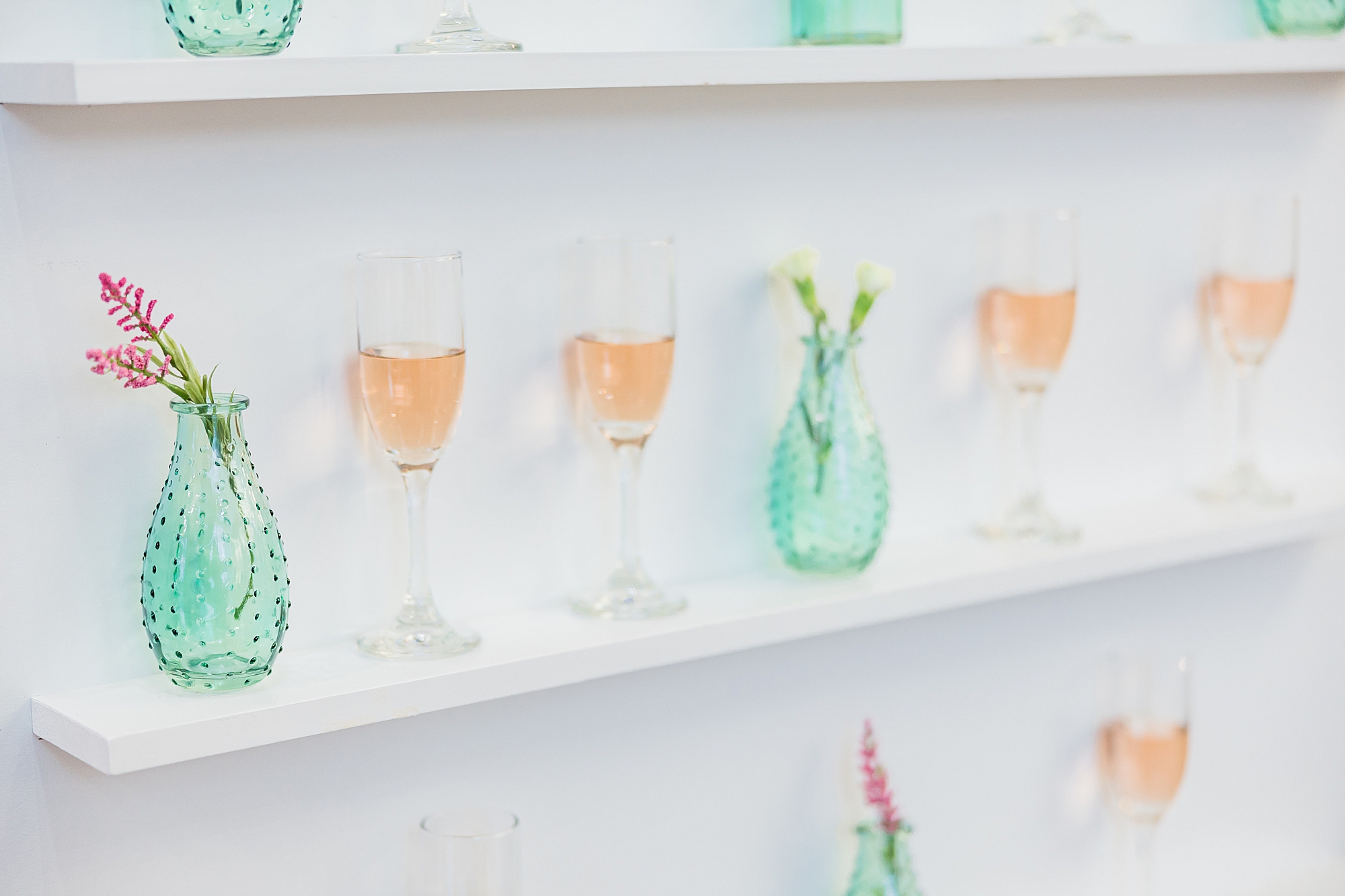 champagne wall for springtime wedding styled shoot