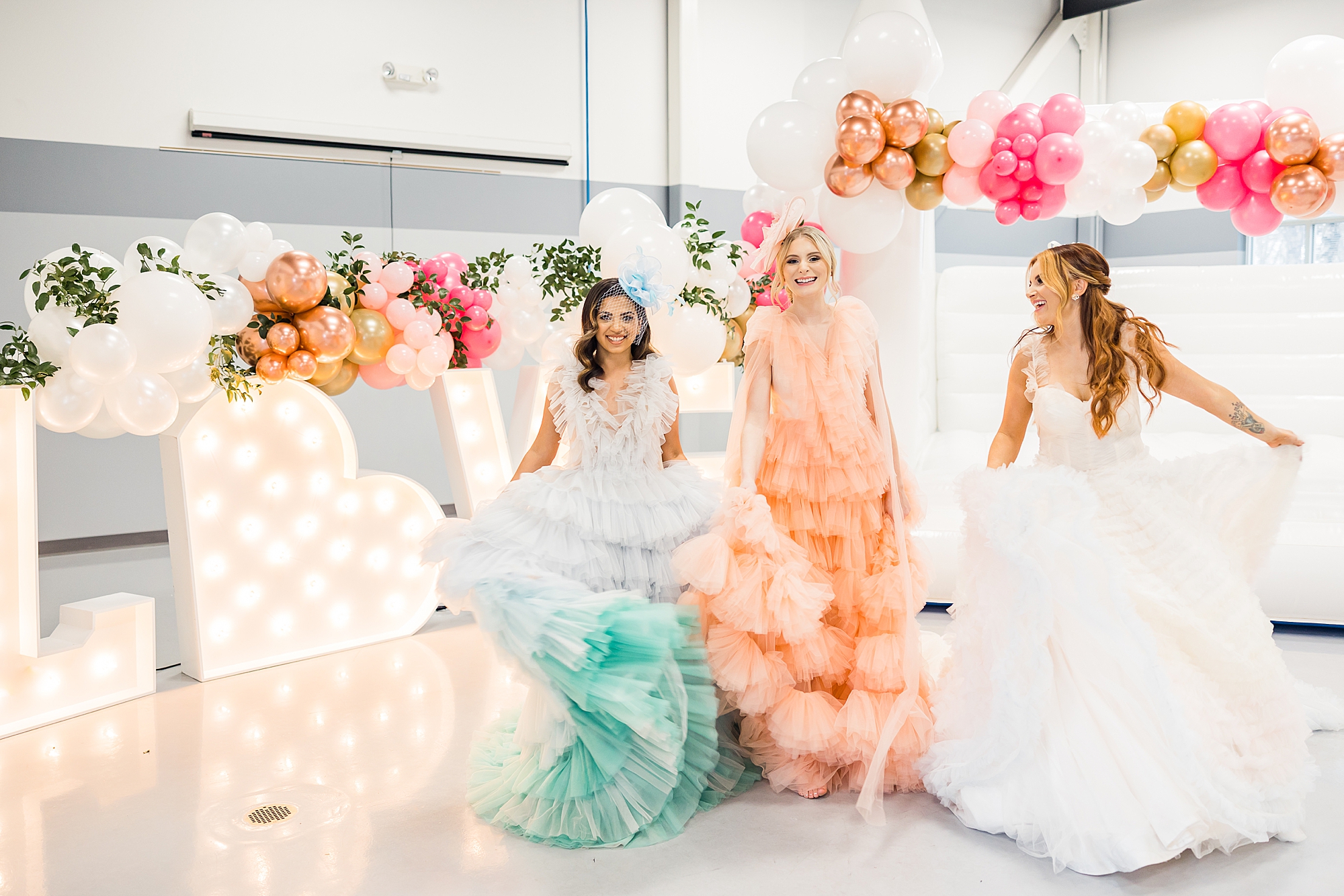 brides twirl gowns by bright LOVE letters