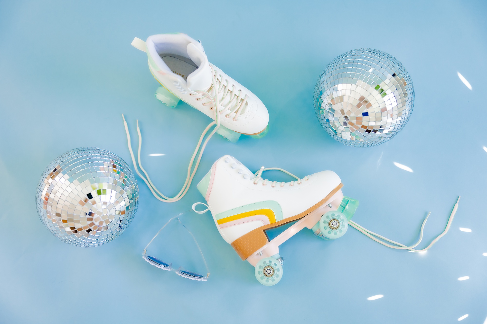 roller skates and disco balls for playful branding portraits