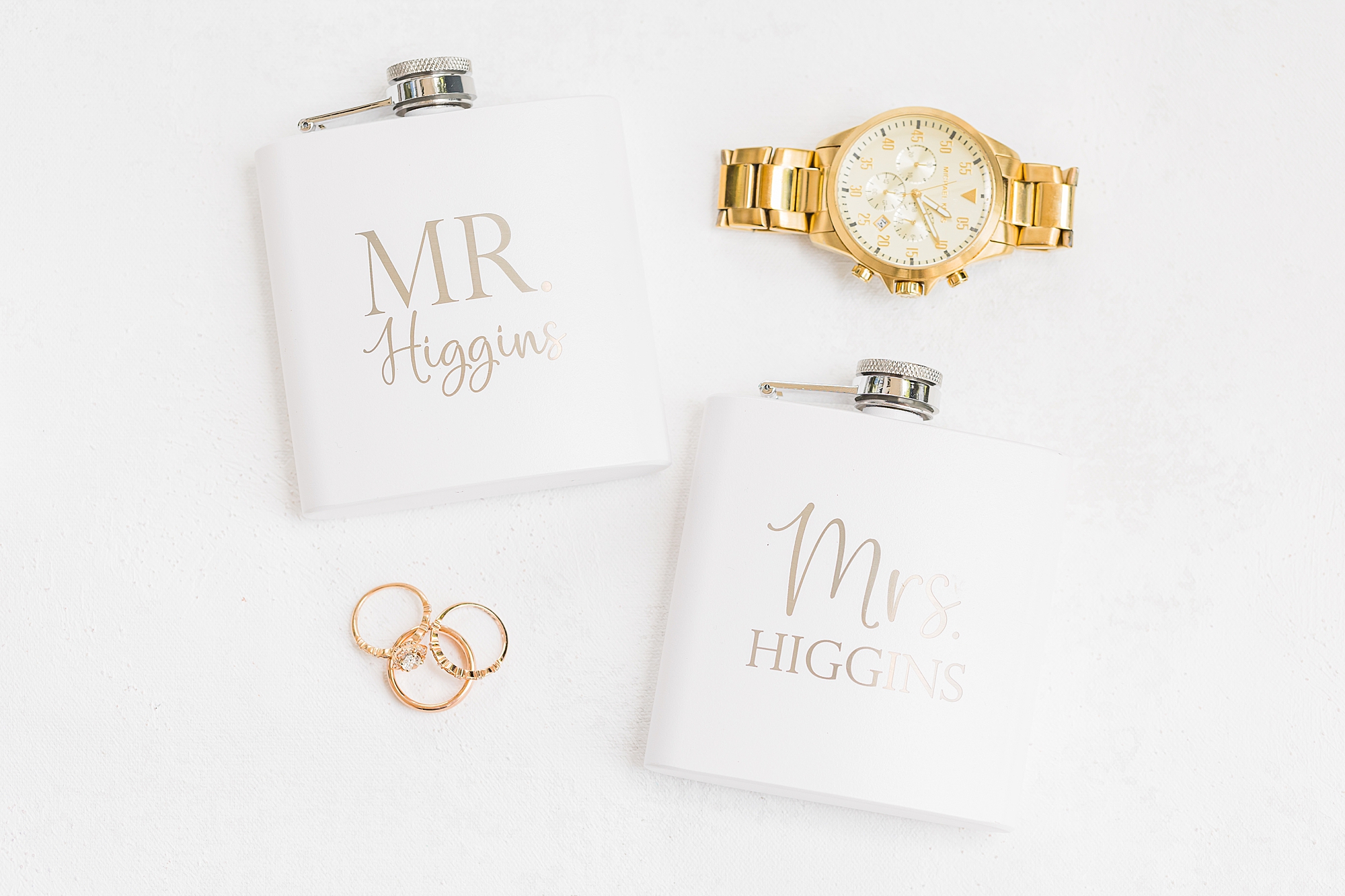 Mr and Mrs flasks with groom's jewelry 