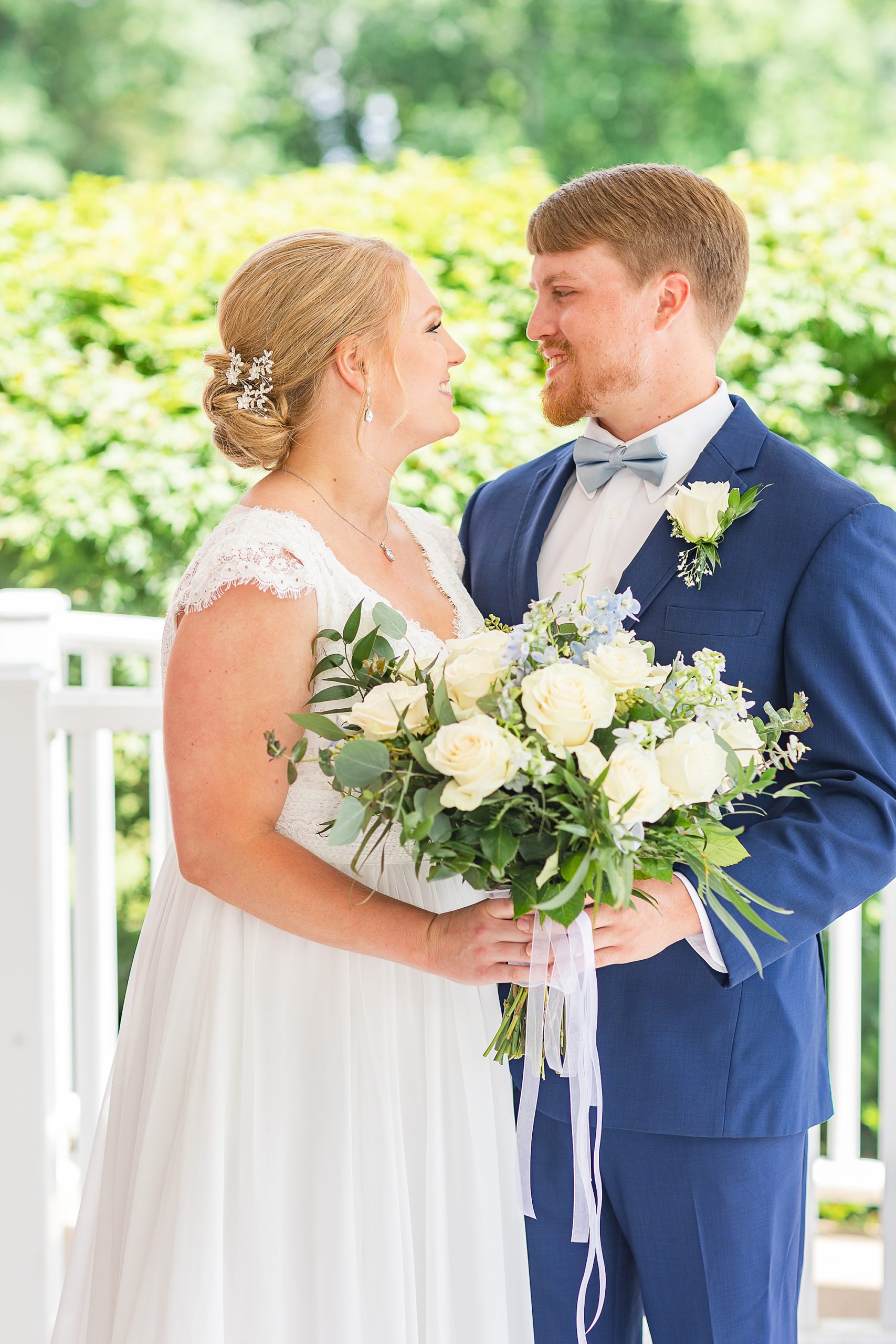 bride and groom smile together during Blairsville GA wedding photos