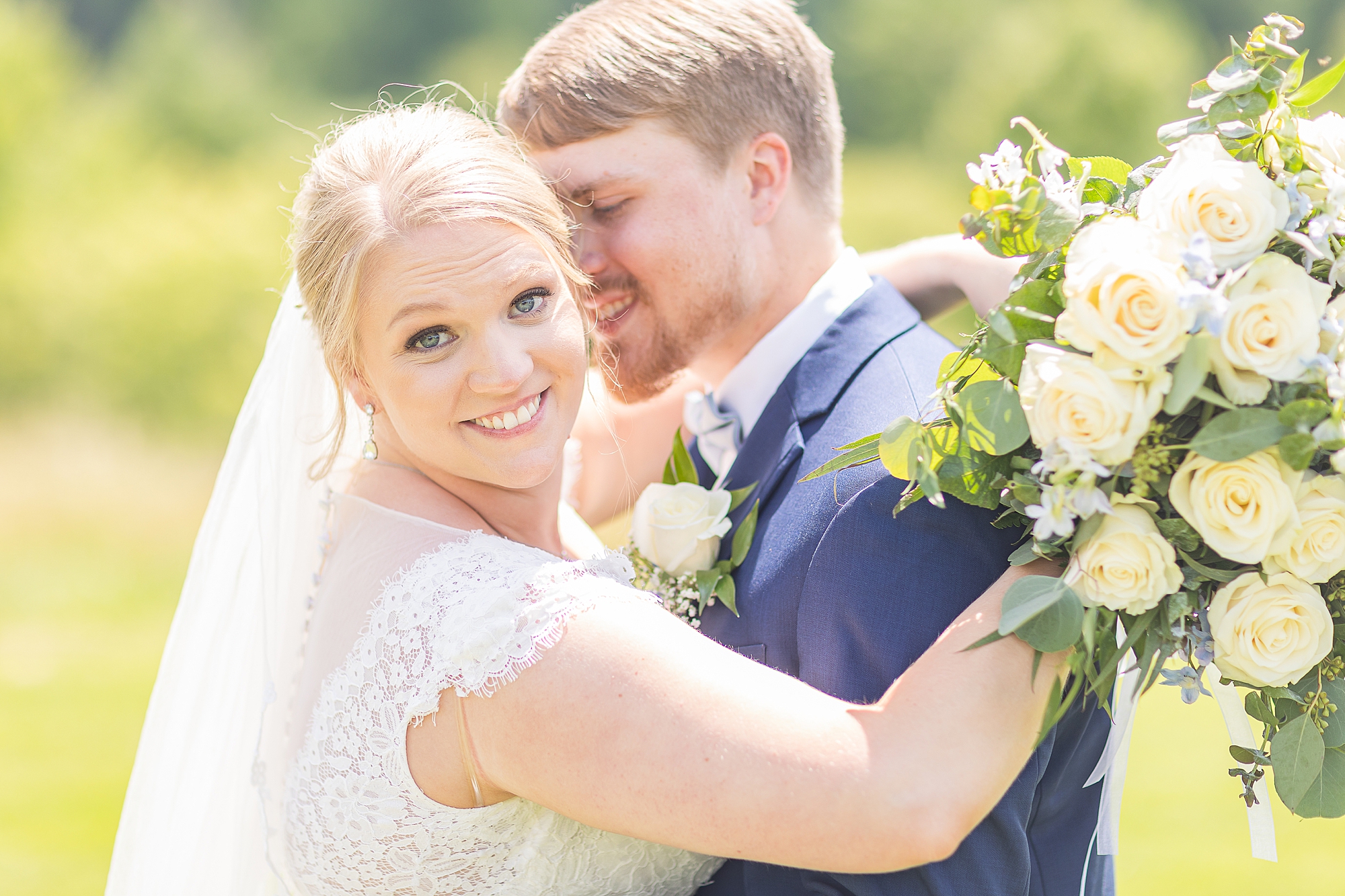 groom nuzzles bride's cheek during Blairsville GA wedding photos