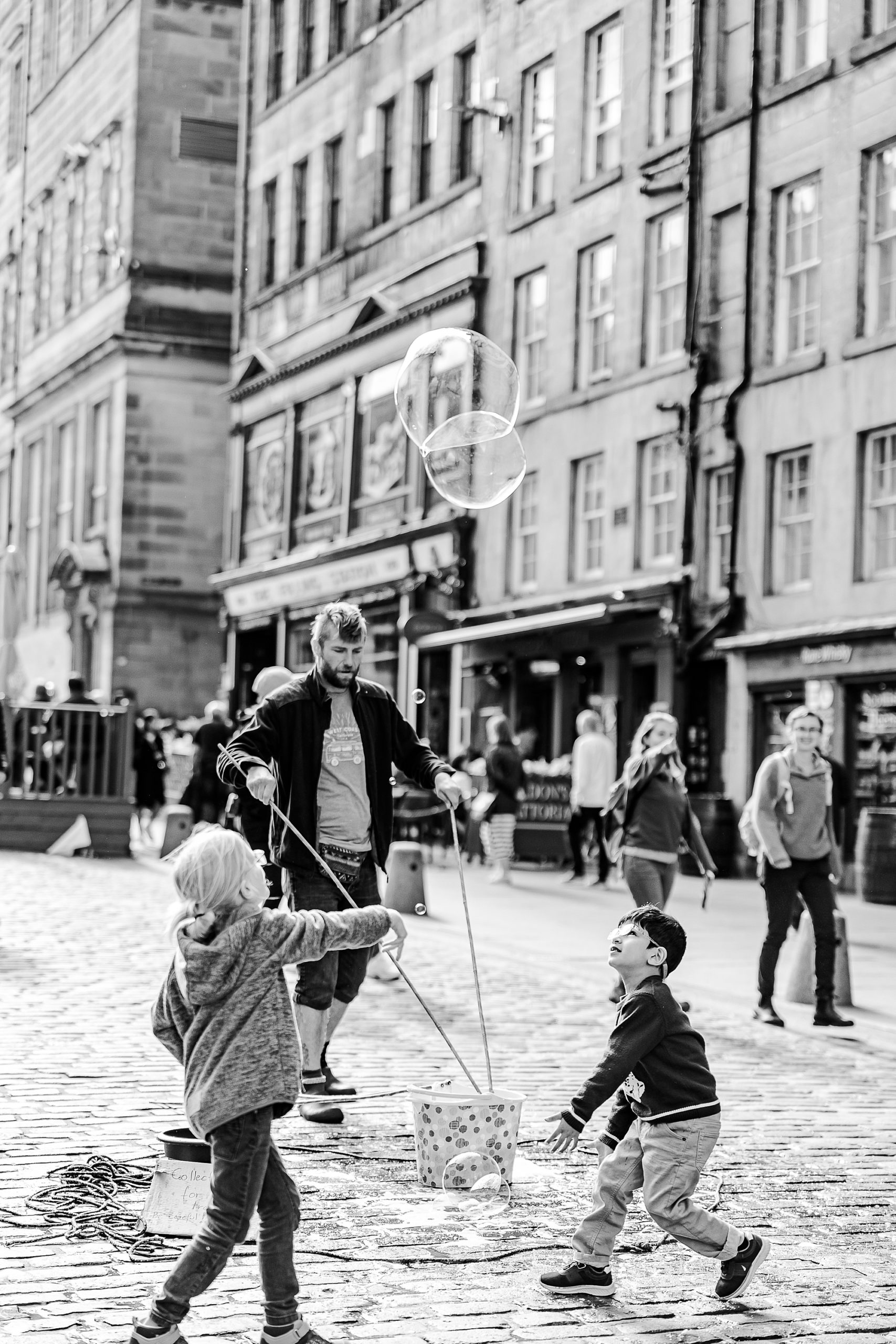 kids play in street in Scotland 