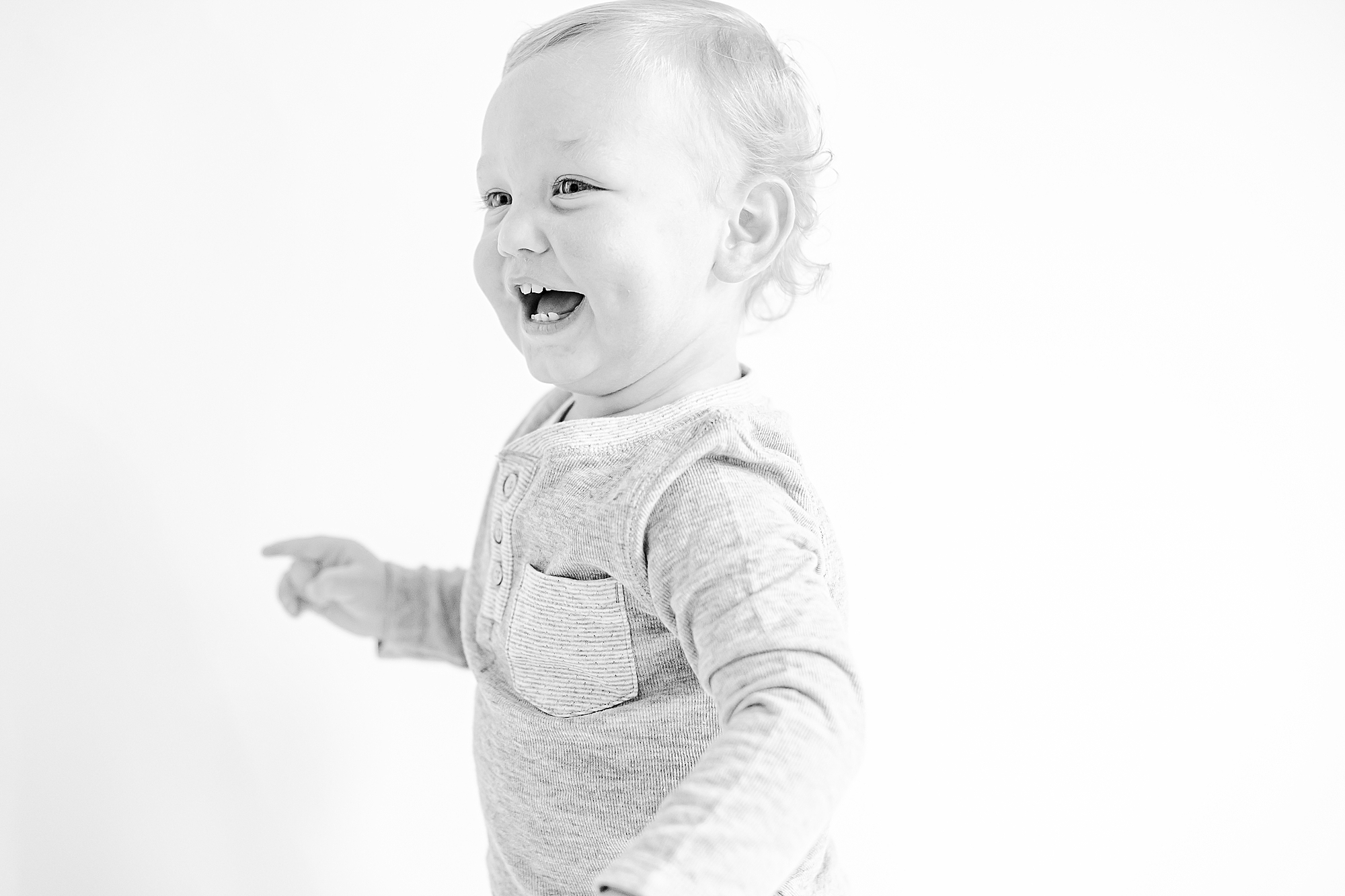 baby laughs during NC studio portraits