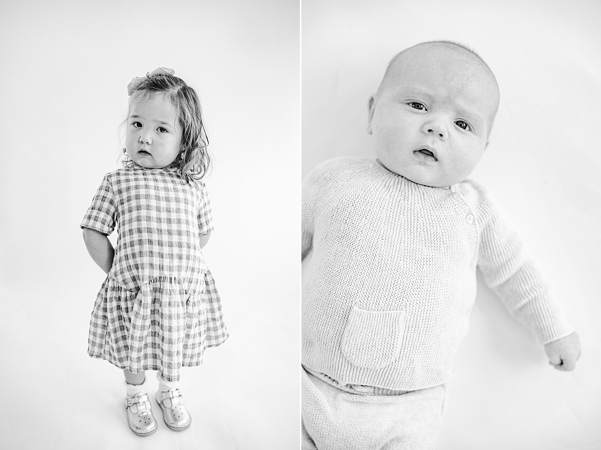 toddler and baby pose during Classic children's portraits in studio