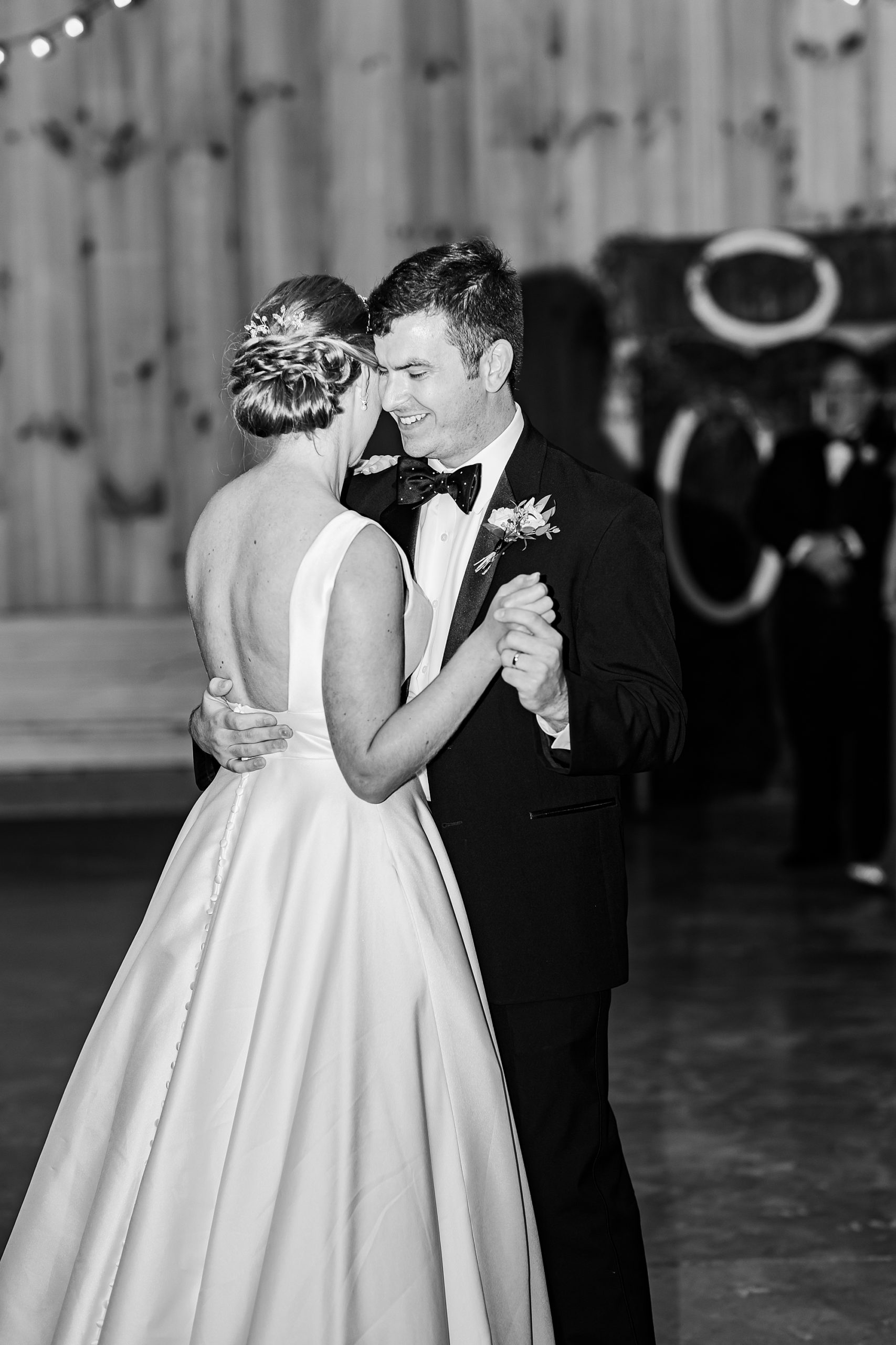 groom and bride dance during NC wedding reception 
