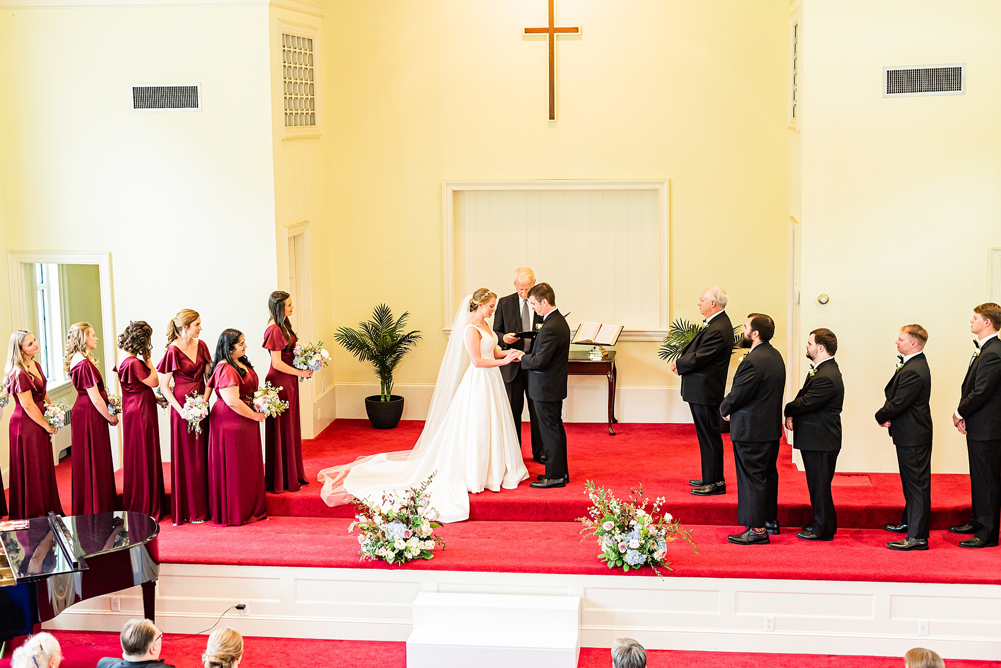 newlyweds exchange vows during traditional ceremony at College Park Baptist Church