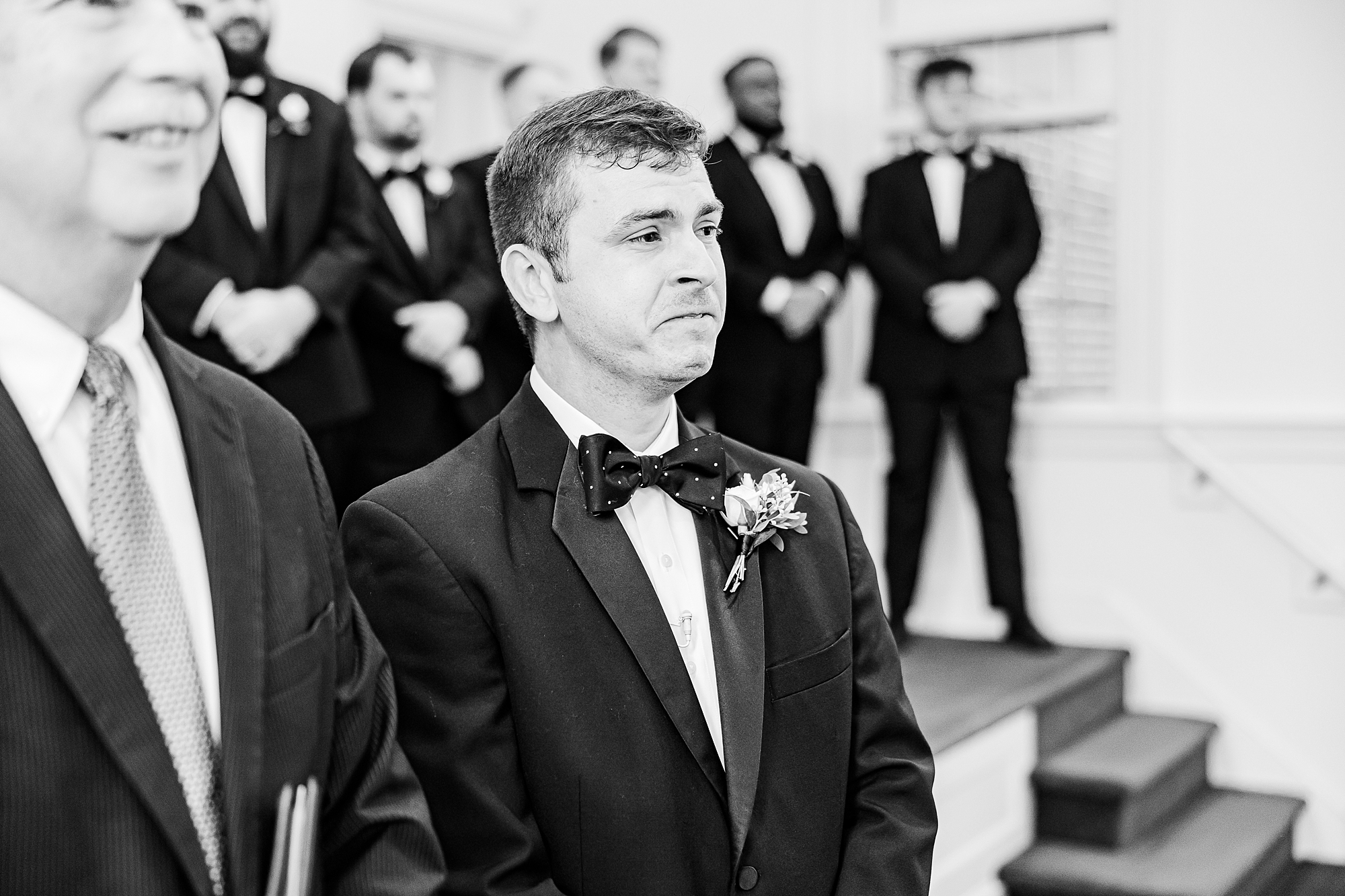 groom tears up watching bride enter ceremony 