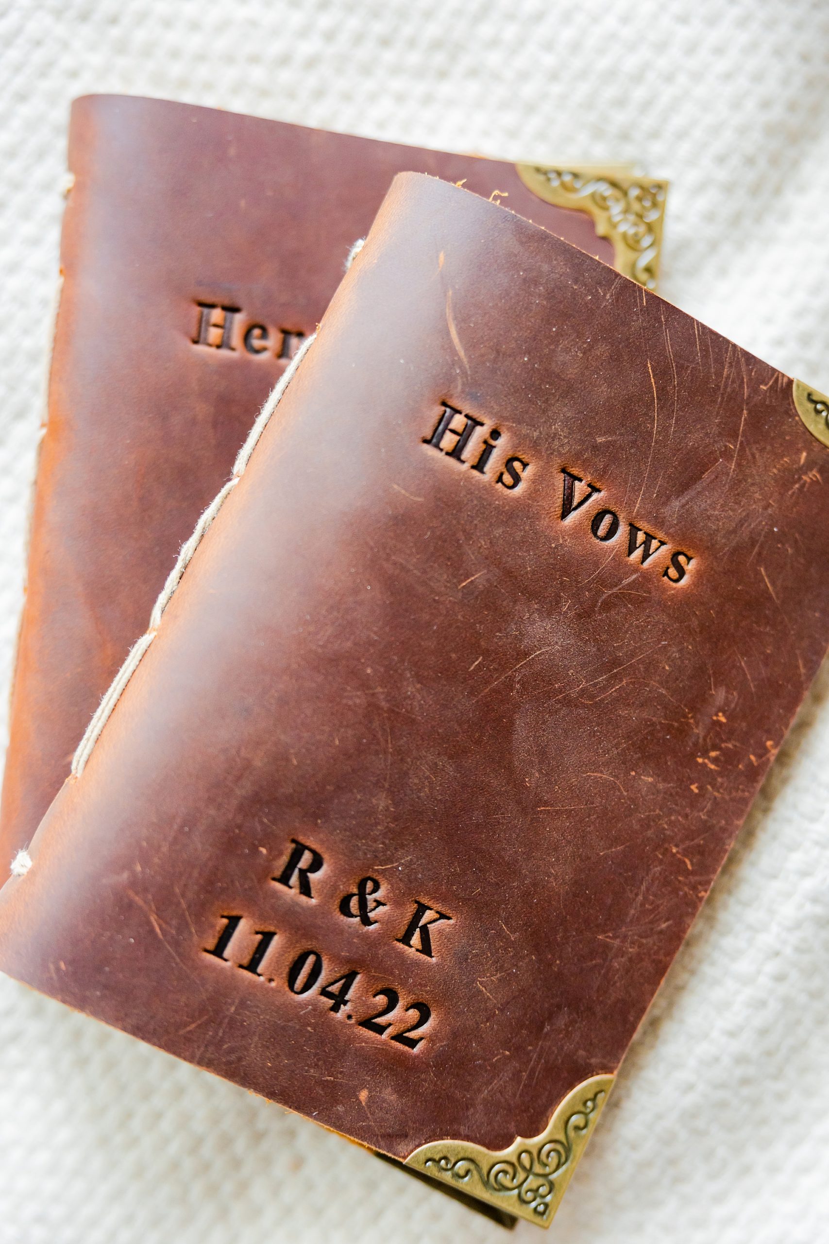 custom leather vow booklets with gold corners 