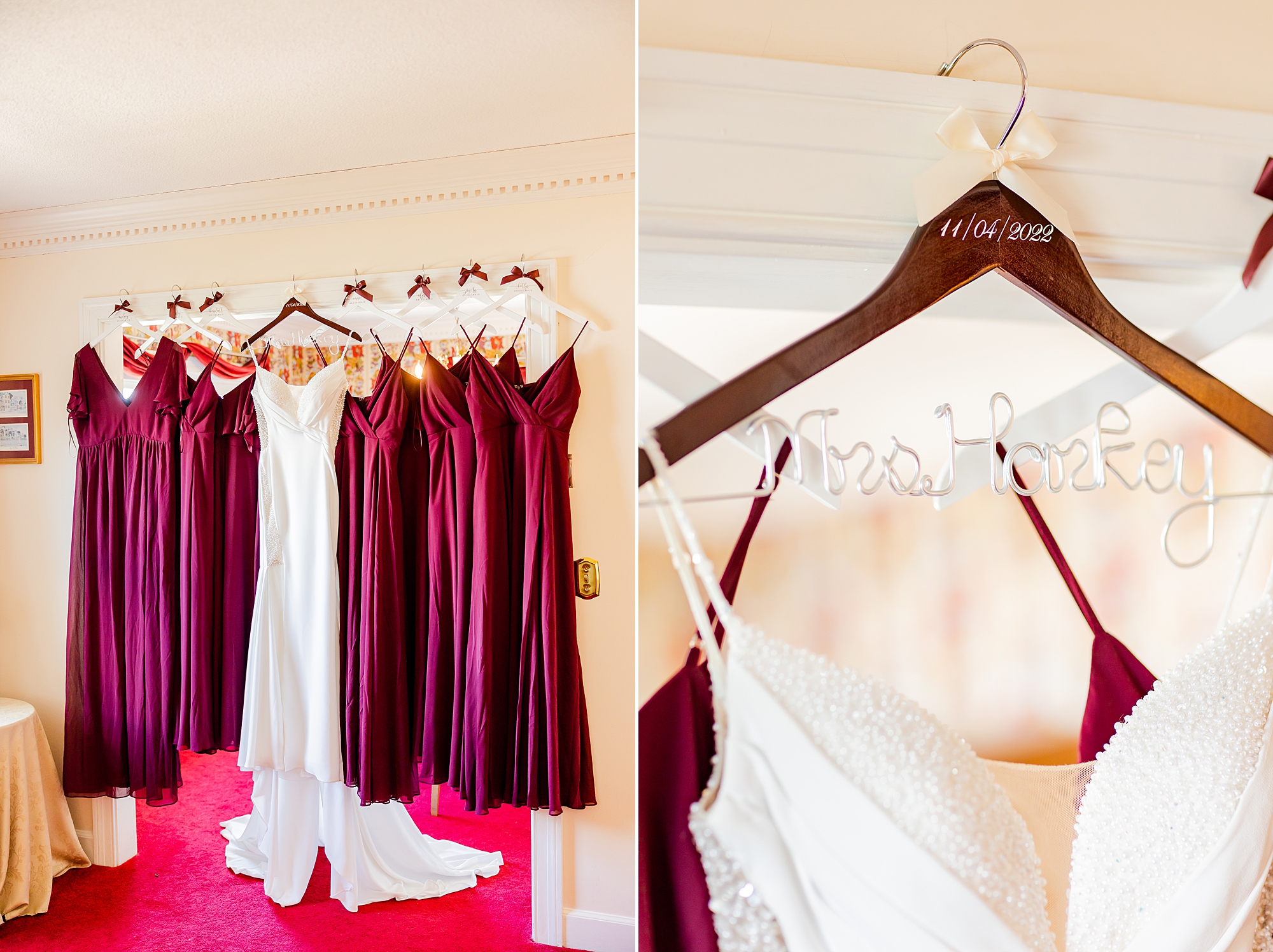 bride's dress hangs on custom wooden hanger with burgundy bridesmaid dresses 