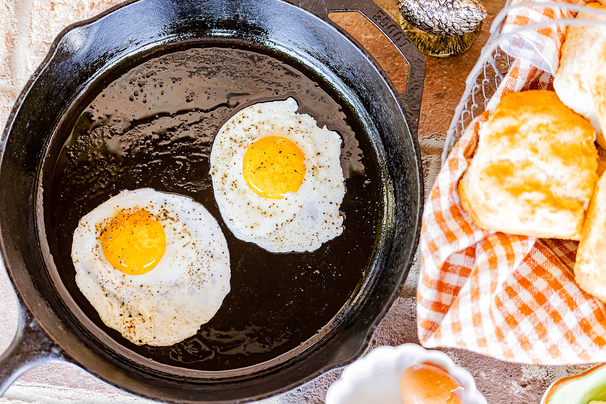 eggs cook in cast iron pan during North Corner Haven product photos