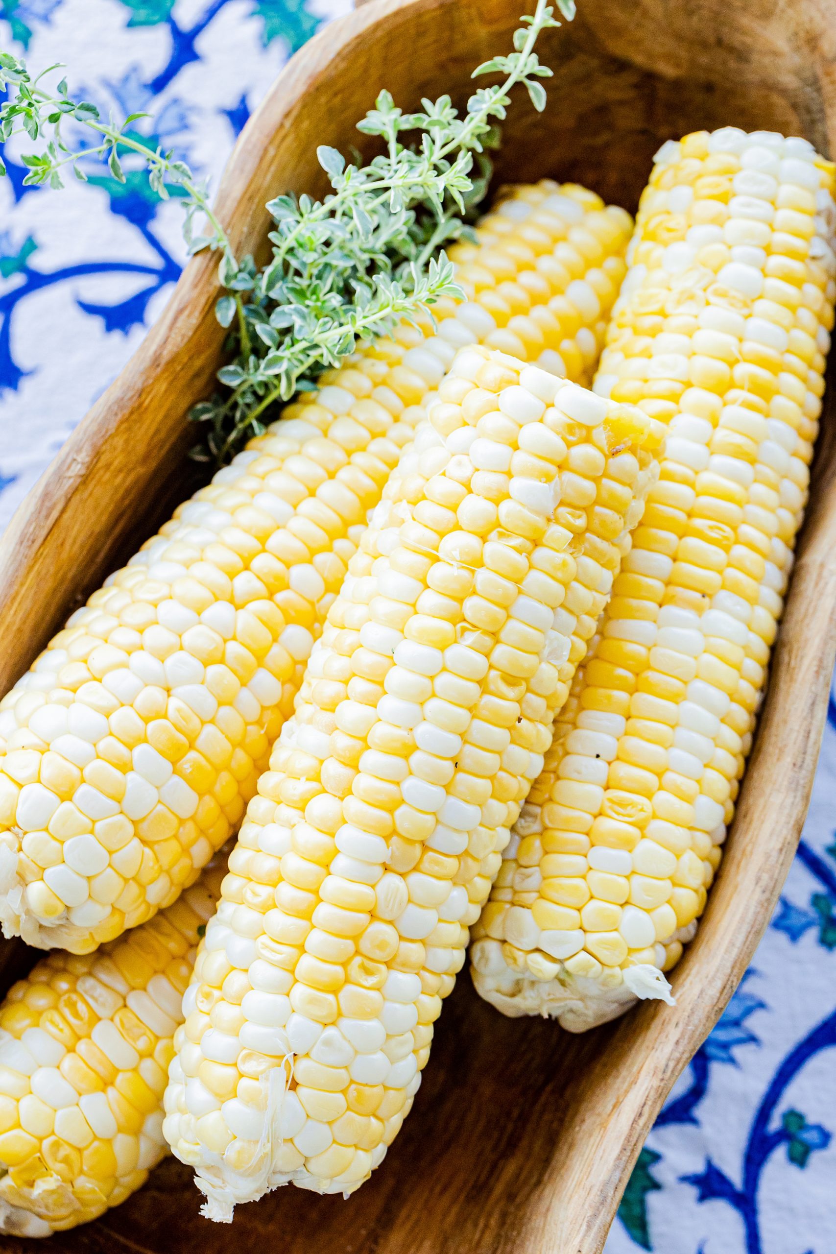 ears of corn in wooden bowl during North Corner Haven product photos